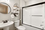 Jack and Jill bathroom with shower tub combo